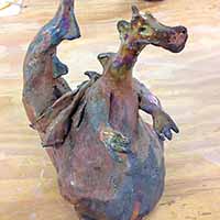 rainbow blue clay dragon sculpture